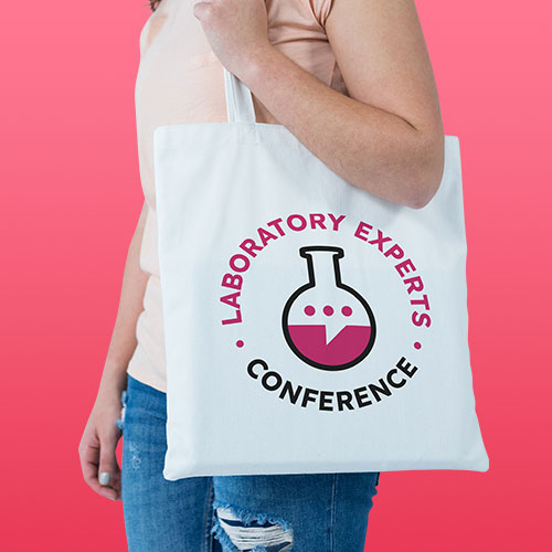 Woman holding a custom-printed tote bag with 